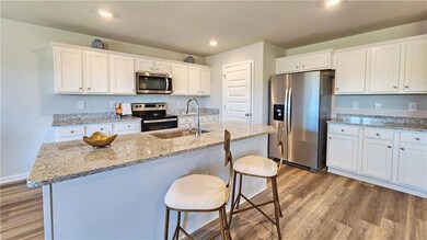 Kitchen featuring appliances with stainless steel 