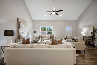 UPGRADED Wide Plank Flooring in Main Living Areas  (Great Room, Kitchen/Dining + Hall)