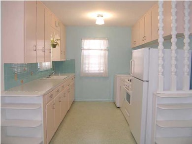 An overview of the kitchen as viewed from the dini