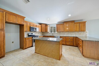 Lots of cabinets with large island