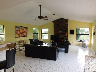 Family room with fireplace and lake view