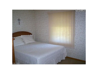 The master bedroom on the first floor has newer ne
