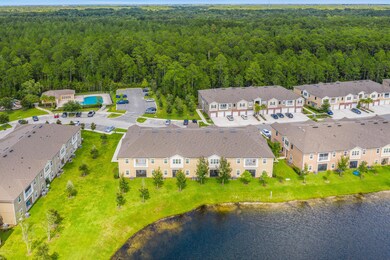 aerial of buildings, pool and play groun