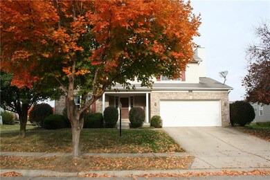 ANOTHER VIEW OF THE FRONT OF THE HOME AND THE BEAUTIFUL TREES IN FRONT YARD