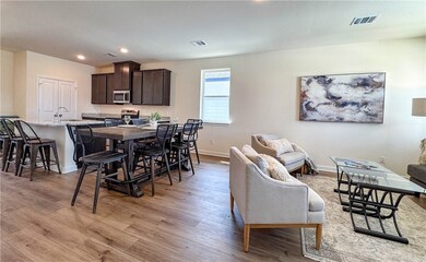 Dining room featuring light wood finished floors,