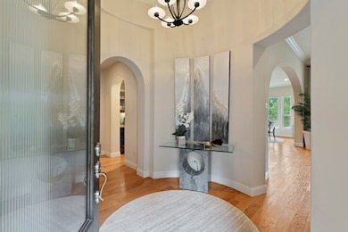 Step into a refined rotunda style entry with rich
