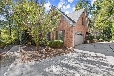 View of side of property featuring a garage