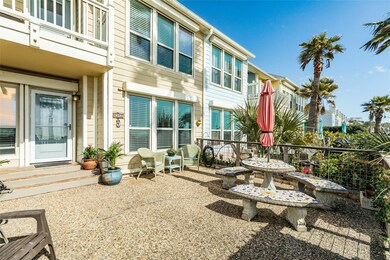 Large patio area is fenced and has a walk-through
