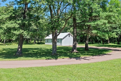 A pole shed set up for storage as you get ready to build your dreams on this property.