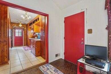 Front Door/Kitchen