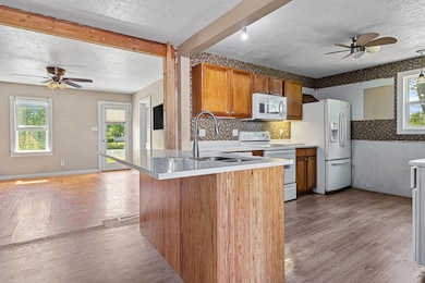 Kitchen with open view to living room