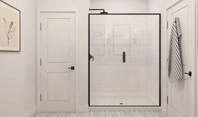 Primary bath with glass shower enclosure