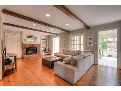 Fabulous family room with a brick fireplace as the