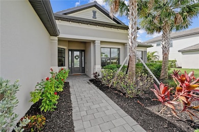 Property entrance featuring stucco siding