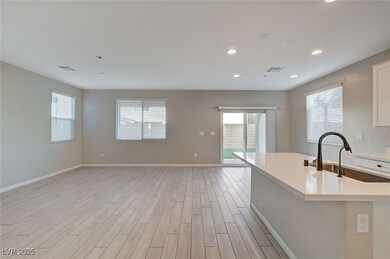 Kitchen with light wood finished floors, visible v