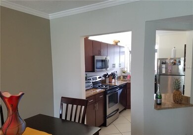 Dining area looking into kitchen
