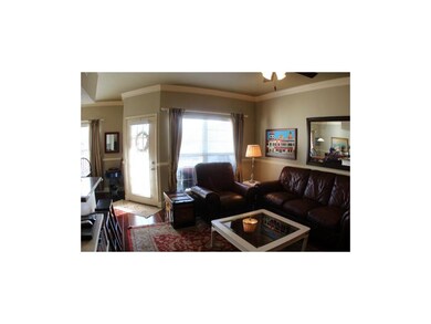 Walk out to Private Patio Overlooking Green space!