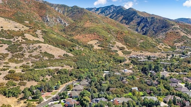 View of mountain background featuring nearby suburban area