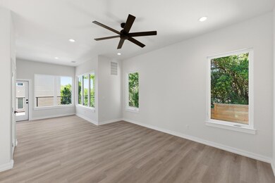 Empty room featuring light wood-style flooring, recessed lighting, and a ceiling fan