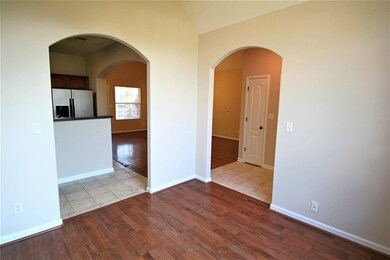 Vaulted Ceiling & Hardwood Floors!