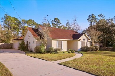 Front View with 2 car garage , wide driveway and r