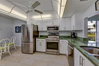 Kitchen featuring  white cabinets, and stainless s