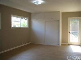 bedroom with access to the backyard