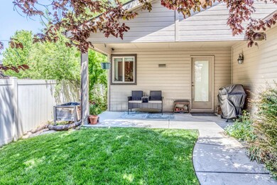 Property entrance with a patio area