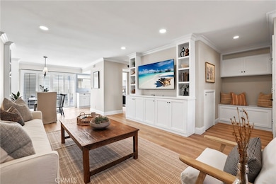 Living room with built in storage and TV wall