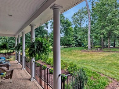 L-shaped covered front porch