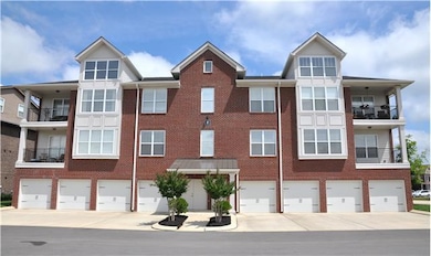 Back of Building F (From Backside of Bldg., Unit F202 is on Second Level on Right Side) 1 Car Garage plus parking outside of Garage