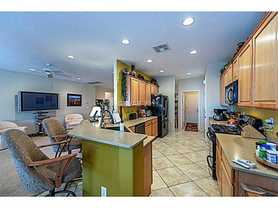 Kitchen. Recessed lighting / large diagonal tile