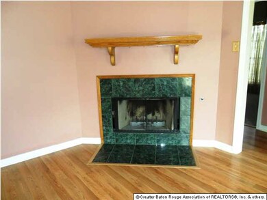 Living Room - Wood burning fireplace with gas.