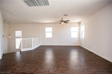 Wide open kitchen/living room with balcony