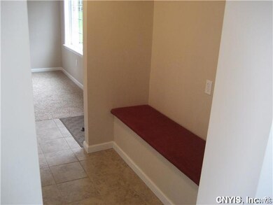 1st Floor Plan coat closet with built in bench at