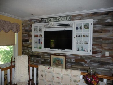 Close up of TV wall above stairs