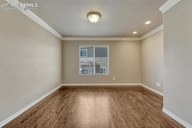 Step into a haven of refinement and efficiency, where french doors, intricate moulding, beautiful wood floors, and subtle recessed lighting create the perfect atmosphere.