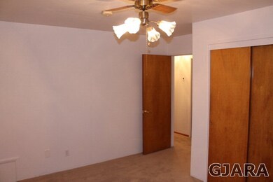 One of three bedrooms upstairs in this great home.