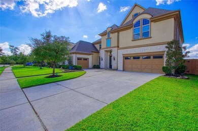 Extended driveway leads to 3 care garage.