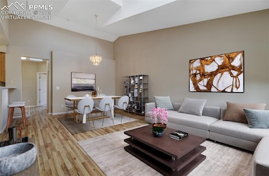 Virtually Staged Great Room as living room and dining area
