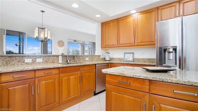 Kitchen featuring sink, hanging light fixtures, li