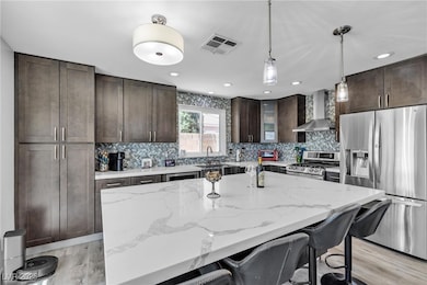 Oversized kitchen island w/ quartz countertops