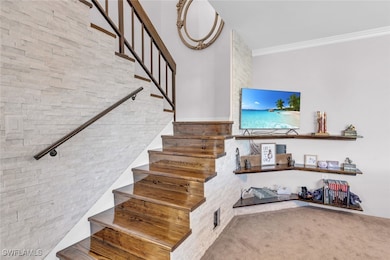Stairs featuring ornamental molding