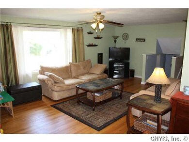 Living Room Spacious Living Room with Refinished H