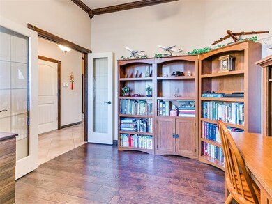 Home office with hardwood / wood-style floors, orn
