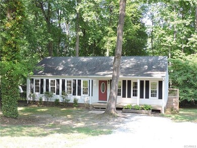 Nice size country porch, pedestrian door to laundr