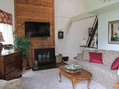 Living Room. Off to the right are the steps to the