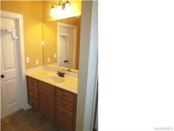 SECOND MASTER BATH VANITY. DOOR TO LEFT IS THE ENT