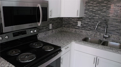 Kitchen new Stainless steel stove and Microwave