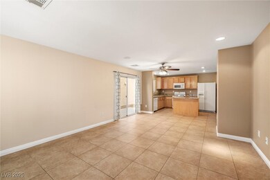 Unfurnished living room featuring visible vents, b